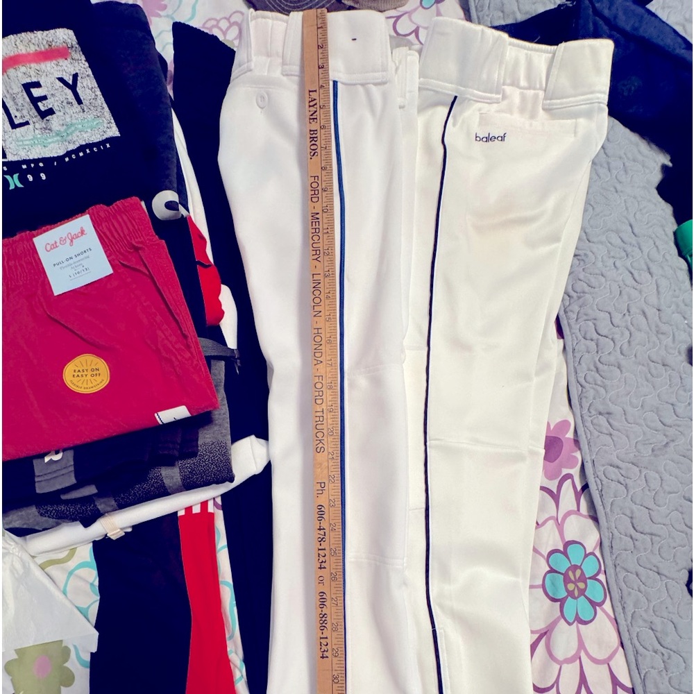 White Baleaf baseball pants are comfortable with about a 28” inseam